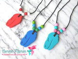 Pendentif DINOSAURE, collier pour enfant, mâchouille, accessoire sensoriel, anti-stress, TDAH, TSA